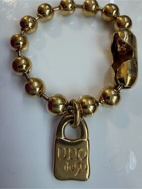 UNO de 50 Gold-Tone Beaded Bracelet with Padlock Charm